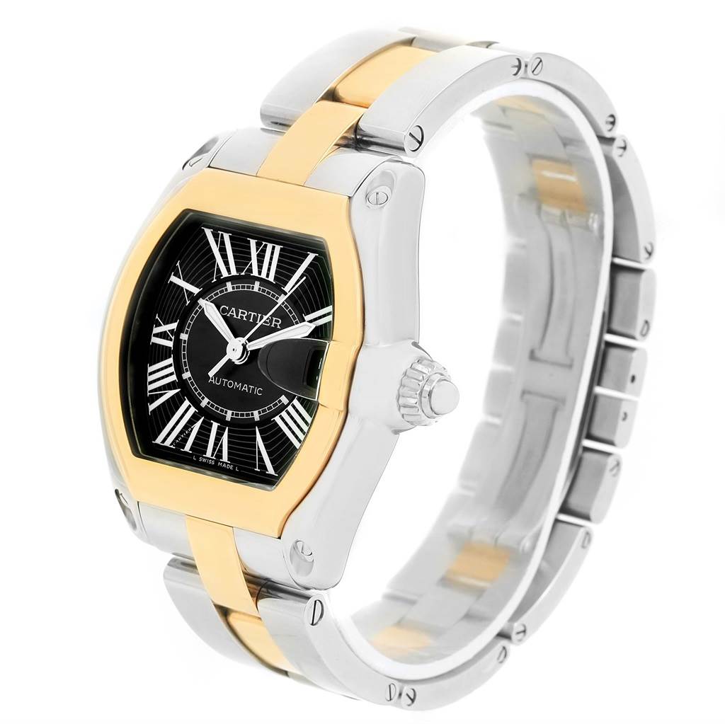 The image shows the Cartier Roadster W62031Y4 Men's Steel and Gold (two tone) Black Dial W62031Y4 Men's Steel and Gold (two tone) Black Dial watch from a three-quarter angle, highlighting the face, crown, and two-tone bracelet.