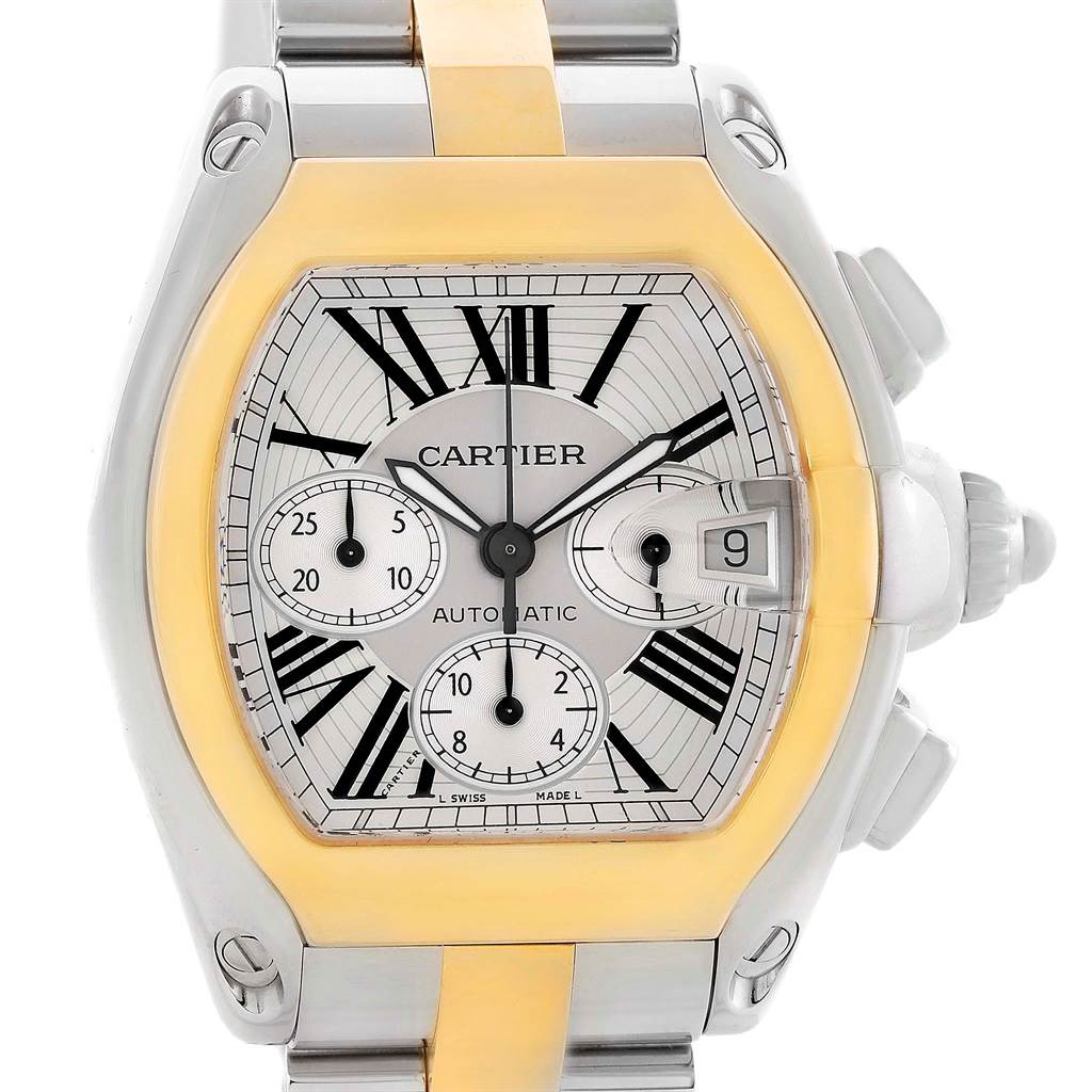 The Cartier Roadster W62027Z1 Men's Steel and Gold (two tone) Silver Dial W62027Z1 Men's Steel and Gold (two tone) Silver Dial watch is shown from the front, highlighting its dial, chronograph subdials, and date window.