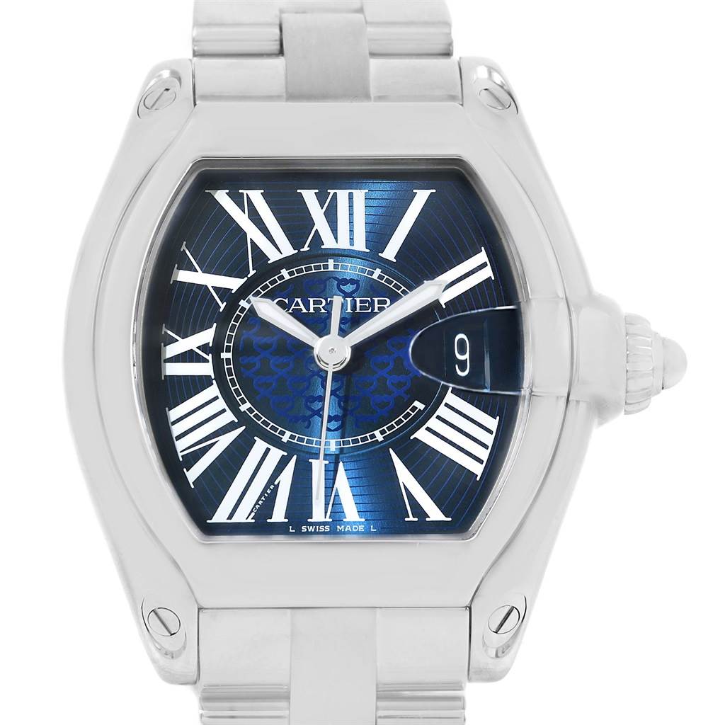 The image shows a close-up of the Cartier Roadster W6206012 Men
s Stainless Steel Blue Dial W6206012 Men
s Stainless Steel Blue Dial watch face and part of its metal bracelet from a frontal angle.