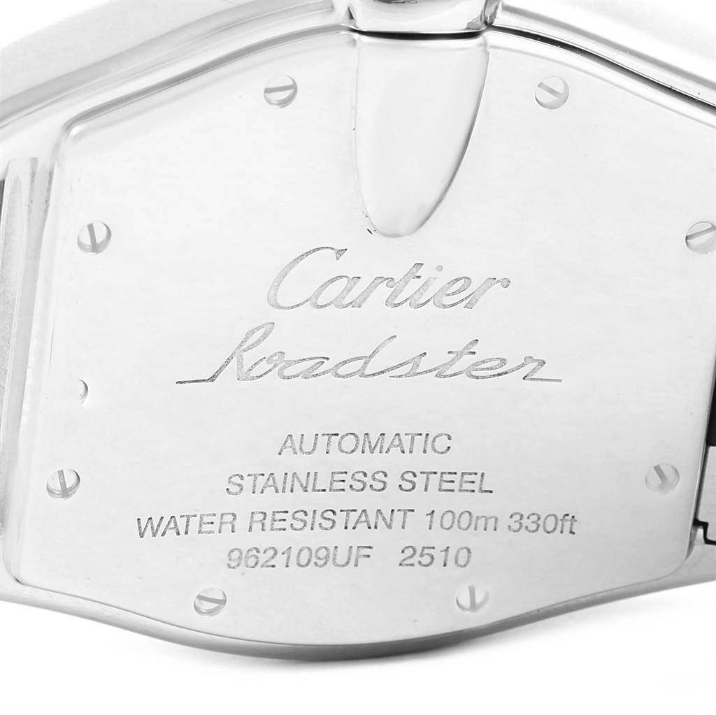 The image shows the back case of a Cartier Roadster W62025V3 Men
s Stainless Steel Silver Dial W62025V3 Men
s Stainless Steel Silver Dial watch, focusing on the engraved details.