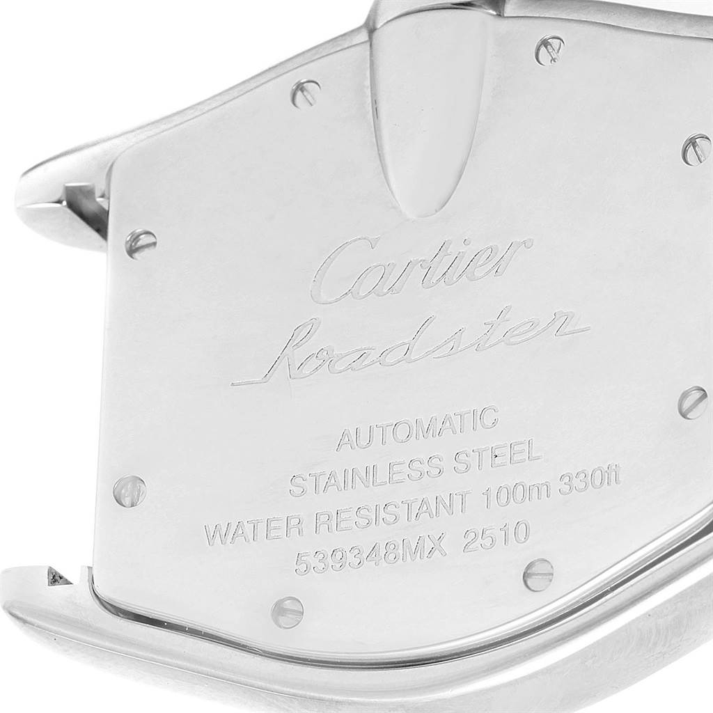 The image shows the back case of a Cartier Roadster W62025V3 Men's Stainless Steel Silver Dial W62025V3 Men's Stainless Steel Silver Dial watch, highlighting its inscriptions and stainless steel material.