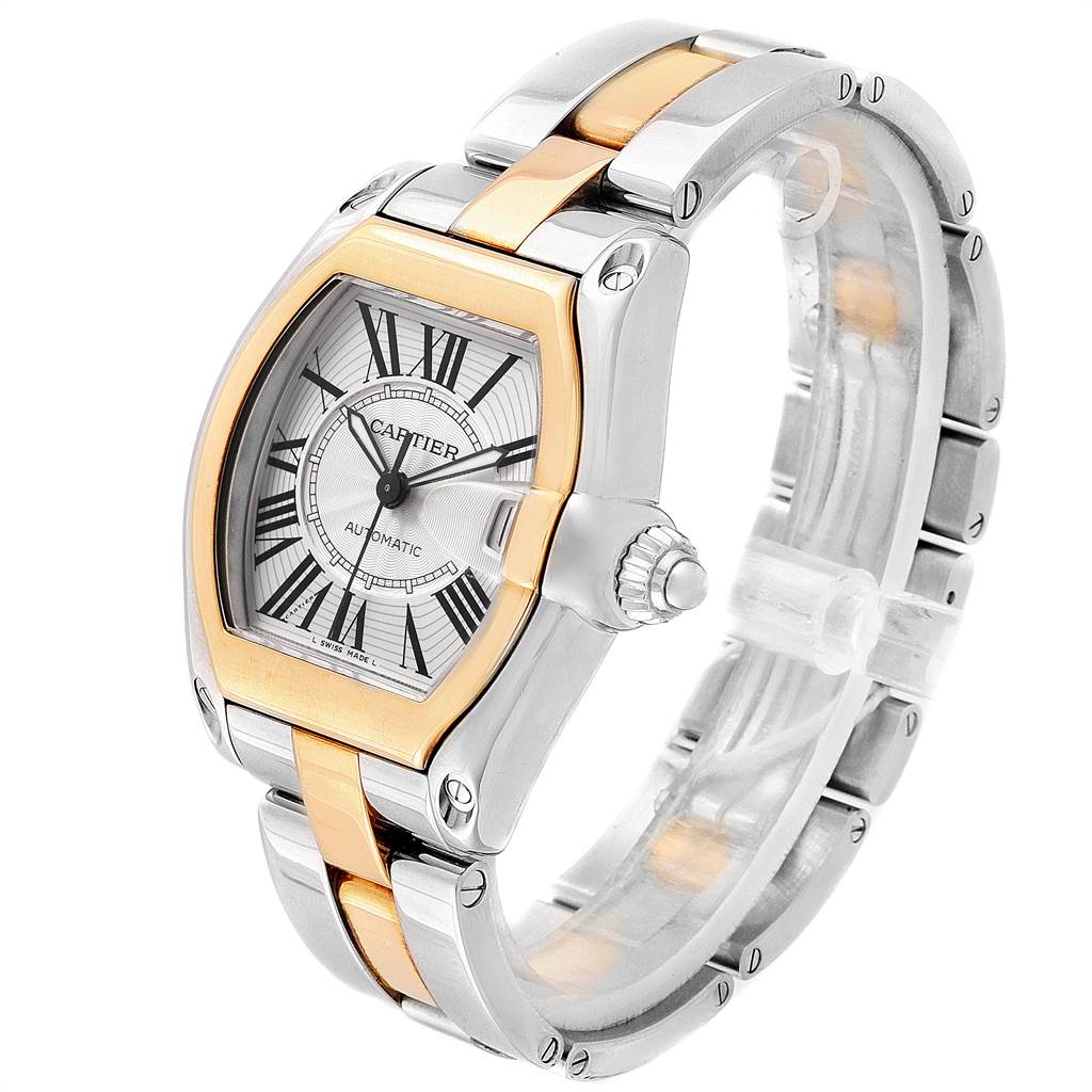 This image shows a Cartier Roadster W62031Y4 Men's Steel and Gold (two tone) Silver Dial W62031Y4 Men's Steel and Gold (two tone) Silver Dial watch at an angle displaying its face, bezel, crown, and bracelet.