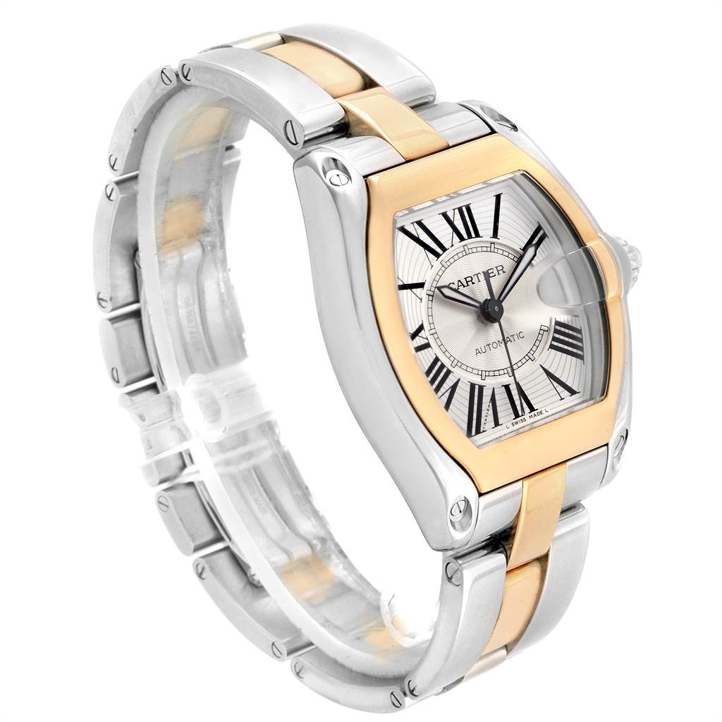 The Cartier Roadster W62031Y4 Men's Steel and Gold (two tone) Silver Dial W62031Y4 Men's Steel and Gold (two tone) Silver Dial watch is shown at a three-quarter angle, highlighting its dial, case, and metal bracelet.