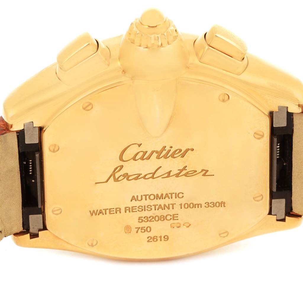 This image shows the back case and clasp area of the Cartier Roadster W62021Y3 Men
s Yellow Gold Champagne Dial W62021Y3 Men
s Yellow Gold Champagne Dial watch, featuring model and brand inscriptions.