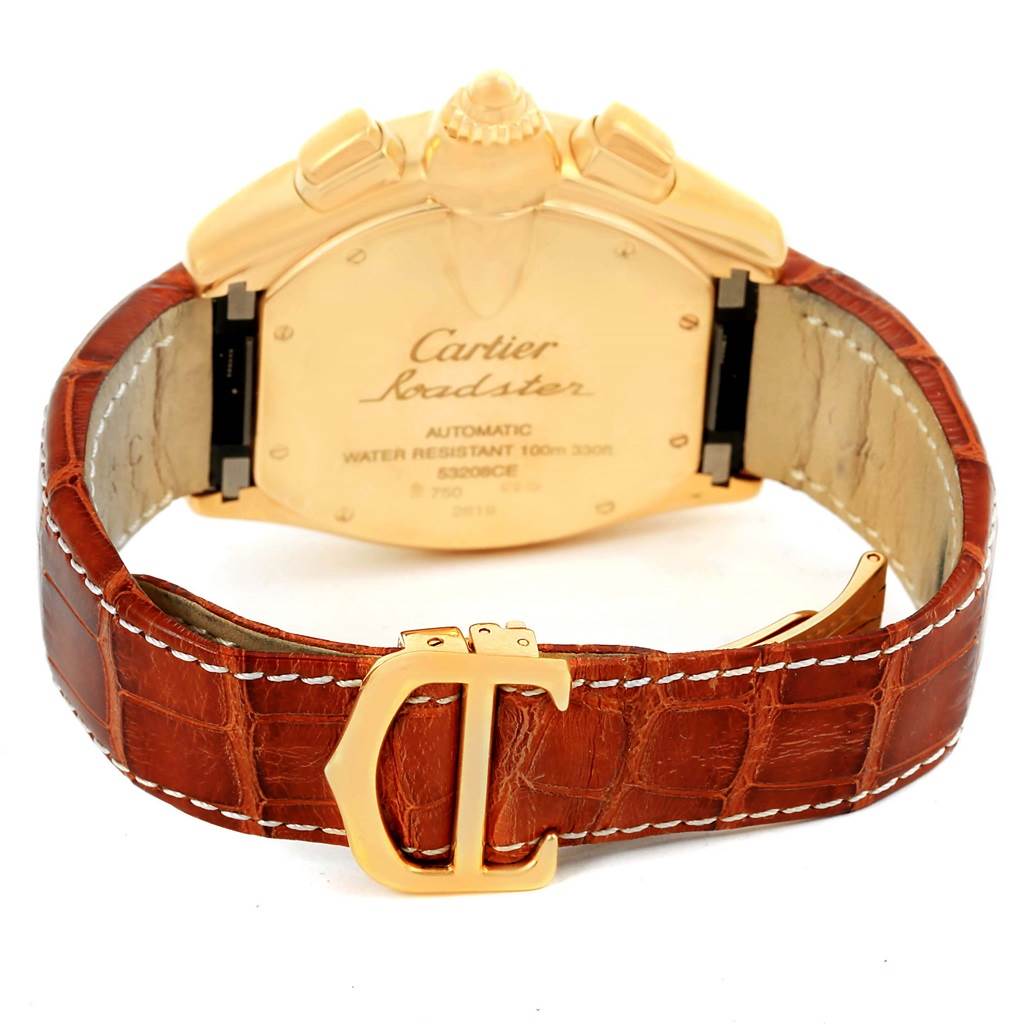 The image shows the back view of a Cartier Roadster W62021Y3 Men
s Yellow Gold Champagne Dial W62021Y3 Men
s Yellow Gold Champagne Dial watch, highlighting the case back, leather strap, and clasp.