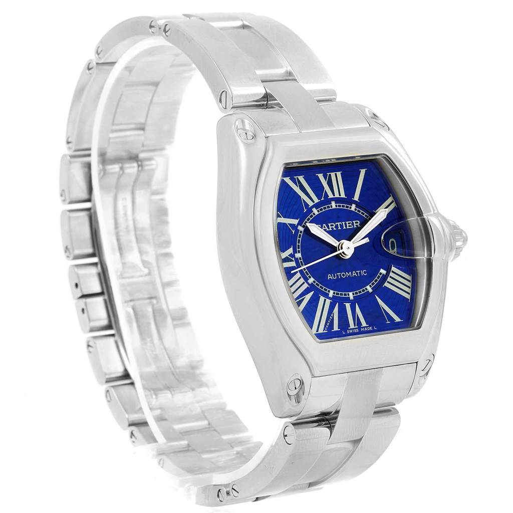 This image shows a side view of the Cartier Roadster W62048V3 Men's Stainless Steel Blue Dial W62048V3 Men's Stainless Steel Blue Dial watch, highlighting its blue dial, Roman numerals, and stainless steel bracelet.