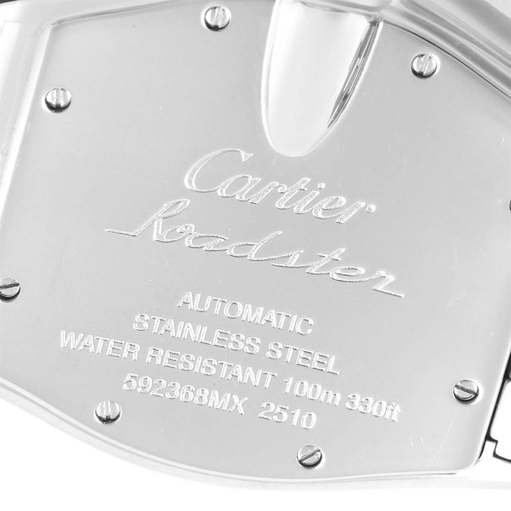 This image shows the back case of a Cartier Roadster W62048V3 Men's Stainless Steel Blue Dial W62048V3 Men's Stainless Steel Blue Dial watch, displaying engravings and screws.