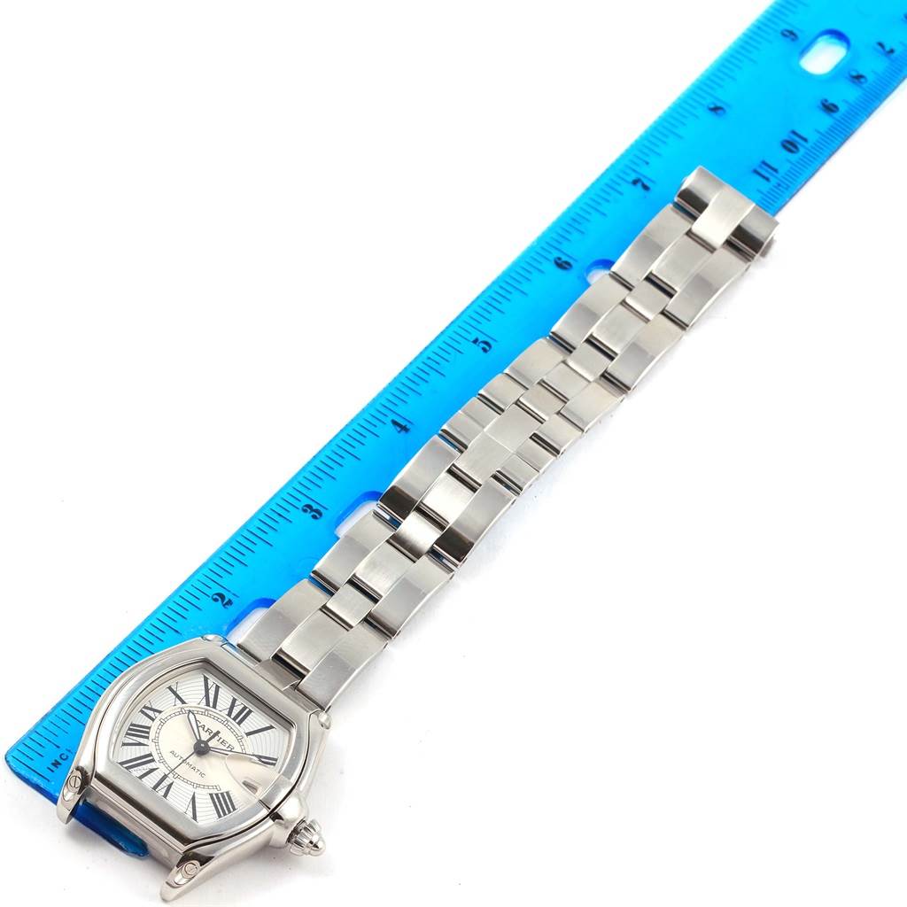 The image shows the entire Roadster watch by Cartier, laying flat with a measuring ruler beside it.