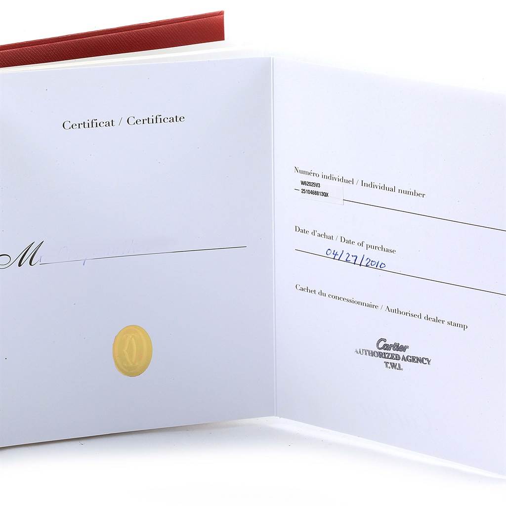 The image shows an open certificate booklet for the Cartier Roadster W62025V3 Men's Stainless Steel Silver Dial W62025V3 Men's Stainless Steel Silver Dial watch, displaying the date of purchase and an authorized dealer stamp.