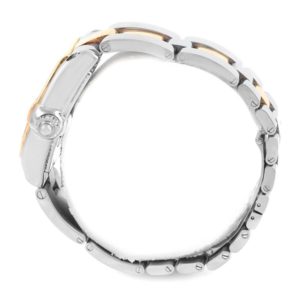 The image shows a side view of the Cartier Roadster W62031Y4 Men's Steel and Gold (two tone) Silver Dial W62031Y4 Men's Steel and Gold (two tone) Silver Dial watch, highlighting the crown and metal bracelet.