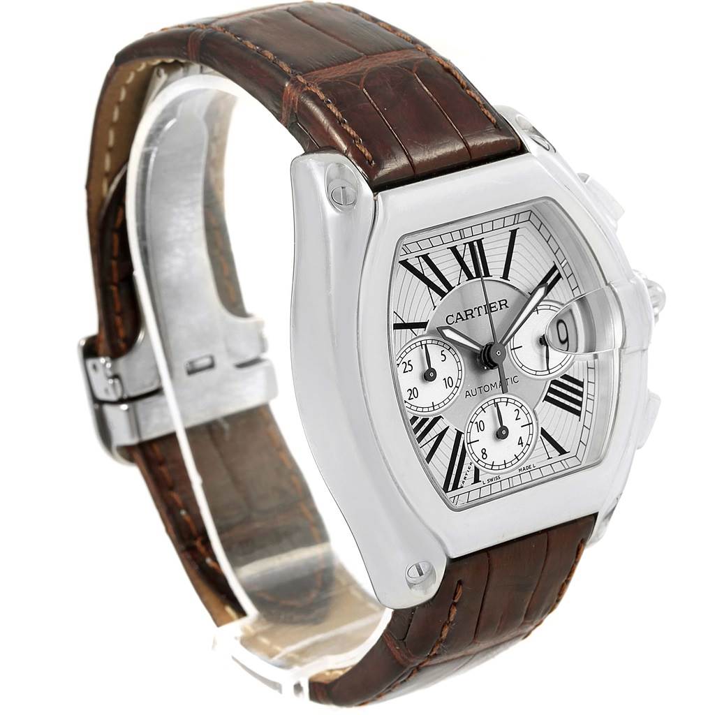 The image shows a side and front view of a Cartier Roadster W62019X6 Men's Stainless Steel Silver Dial W62019X6 Men's Stainless Steel Silver Dial watch, highlighting its face and brown leather strap.