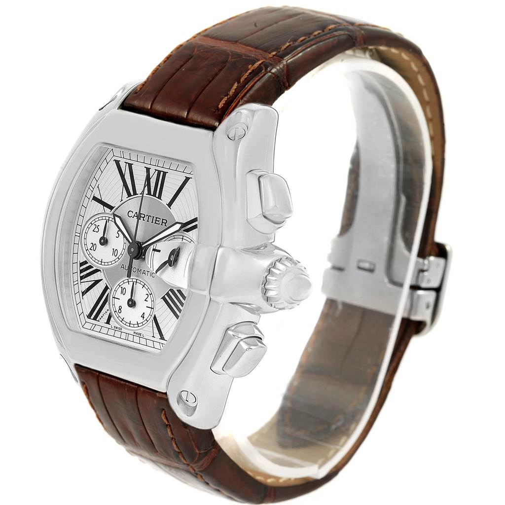 This image shows a Cartier Roadster W62019X6 Men's Stainless Steel Silver Dial W62019X6 Men's Stainless Steel Silver Dial watch from a front-side angle, displaying its face, crown, pushers, and brown leather strap.