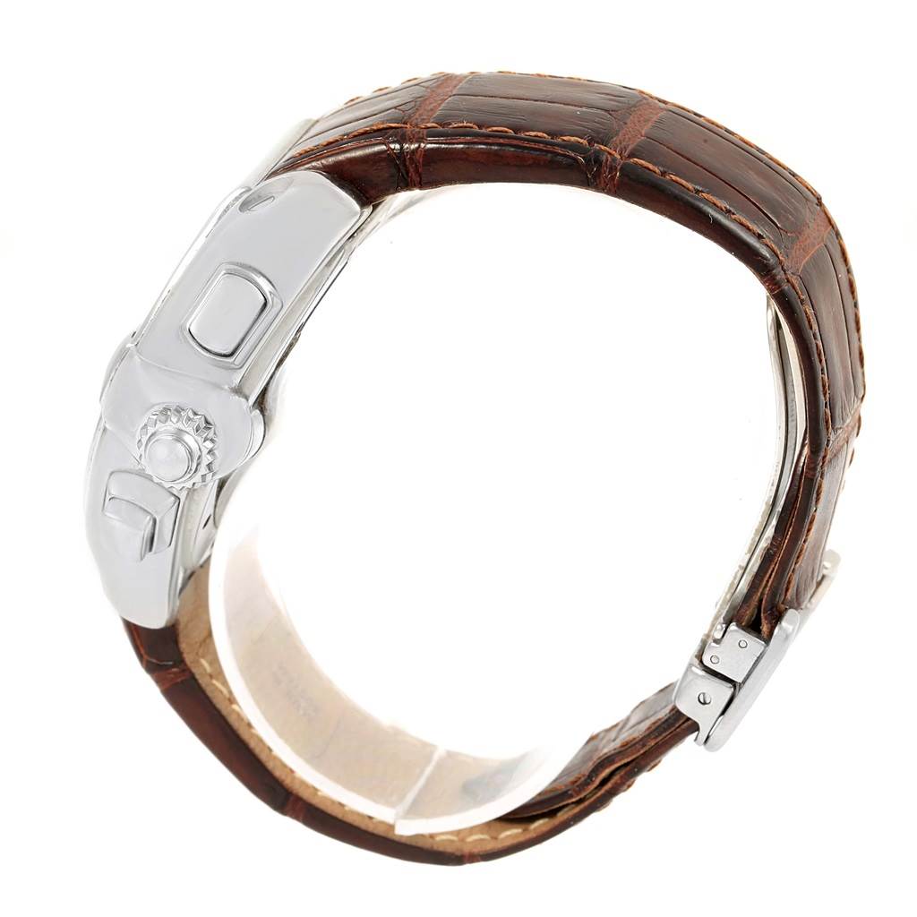 This image shows a side view of a Cartier Roadster W62019X6 Men's Stainless Steel Silver Dial W62019X6 Men's Stainless Steel Silver Dial watch, highlighting the crown, case, and brown leather strap.