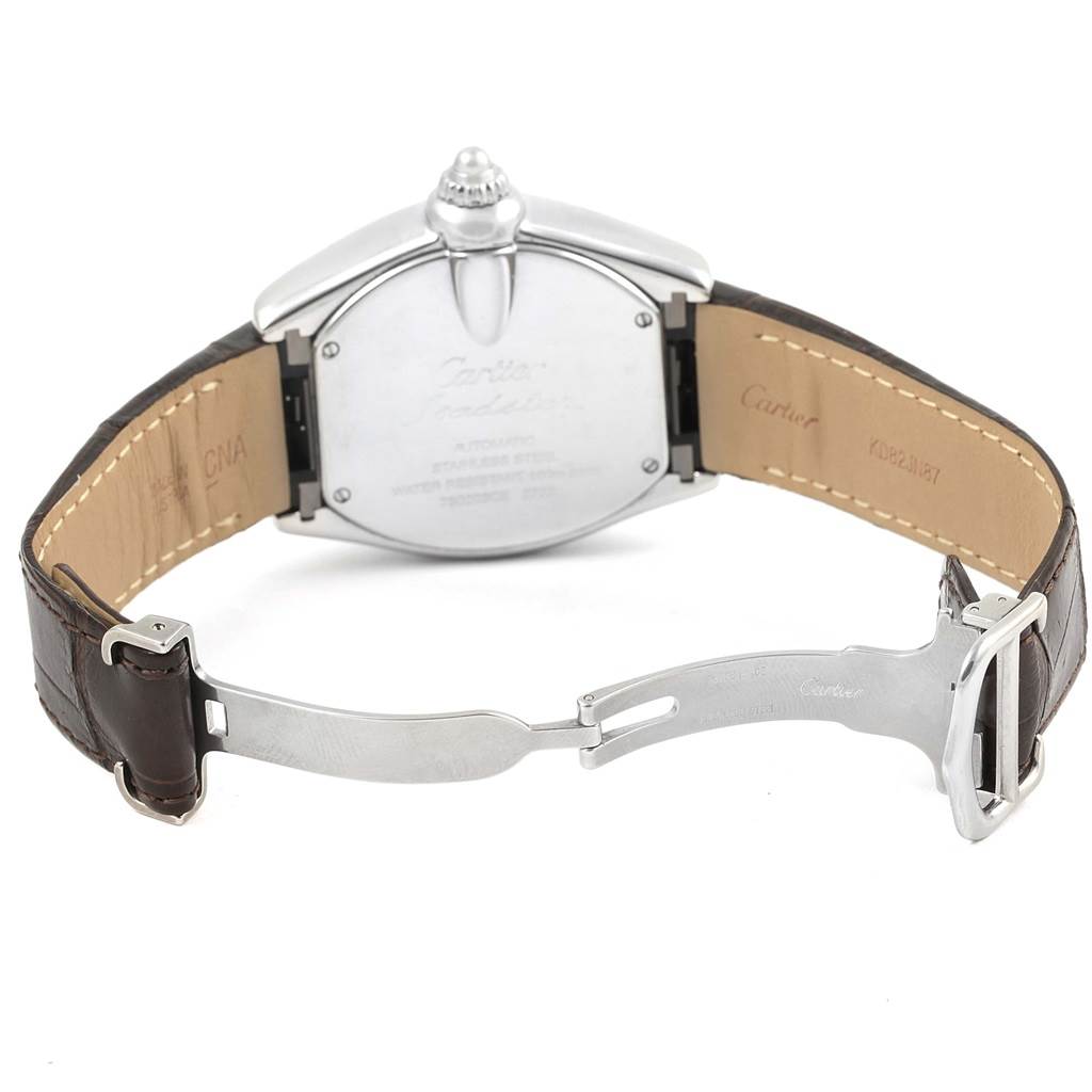 The image shows the back and clasp of a Cartier Roadster W62032X6 Men's Stainless Steel Silver Dial W62032X6 Men's Stainless Steel Silver Dial watch, highlighting the case back and leather strap with a deployment buckle.