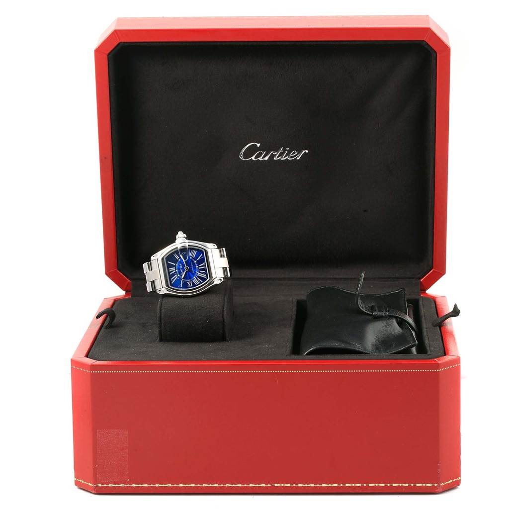 The Cartier Roadster W62048V3 Men's Stainless Steel Blue Dial W62048V3 Men's Stainless Steel Blue Dial watch is shown in its open red case, revealing a stainless steel band and blue dial.
