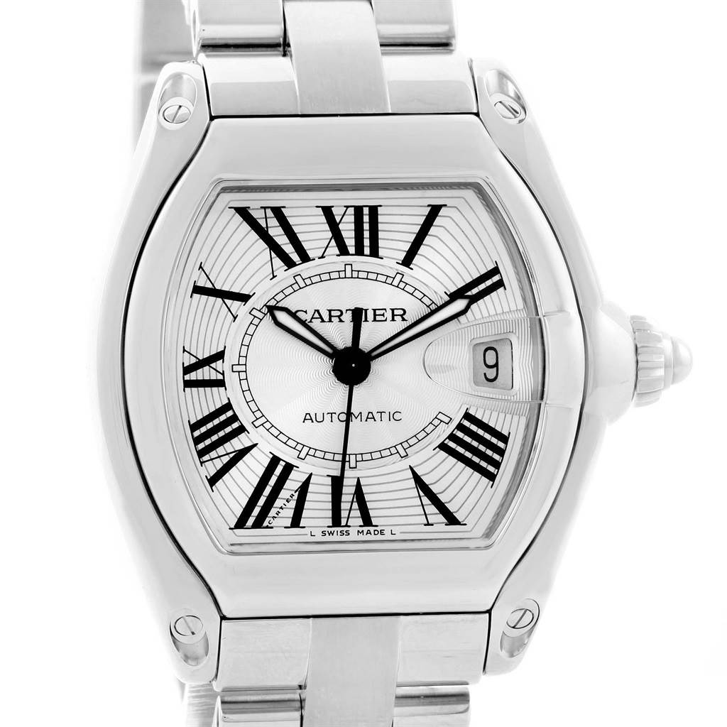 The image shows a front view of the Cartier Roadster W62025V3 Men's Stainless Steel Silver Dial W62025V3 Men's Stainless Steel Silver Dial watch, highlighting its face, bezel, crown, and part of the bracelet.