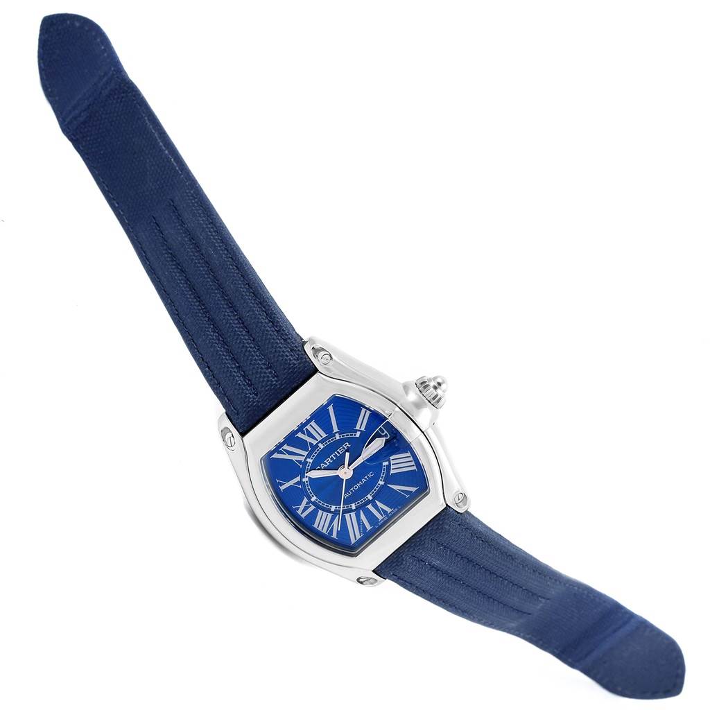 The image shows the Cartier Roadster W62048V3 Men's Stainless Steel Blue Dial W62048V3 Men's Stainless Steel Blue Dial watch at a slight angle, highlighting its face, case, and strap.