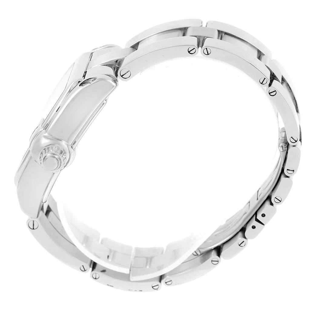 This image shows a side view of a Roadster model by Cartier, detailing the crown and part of the metal bracelet.