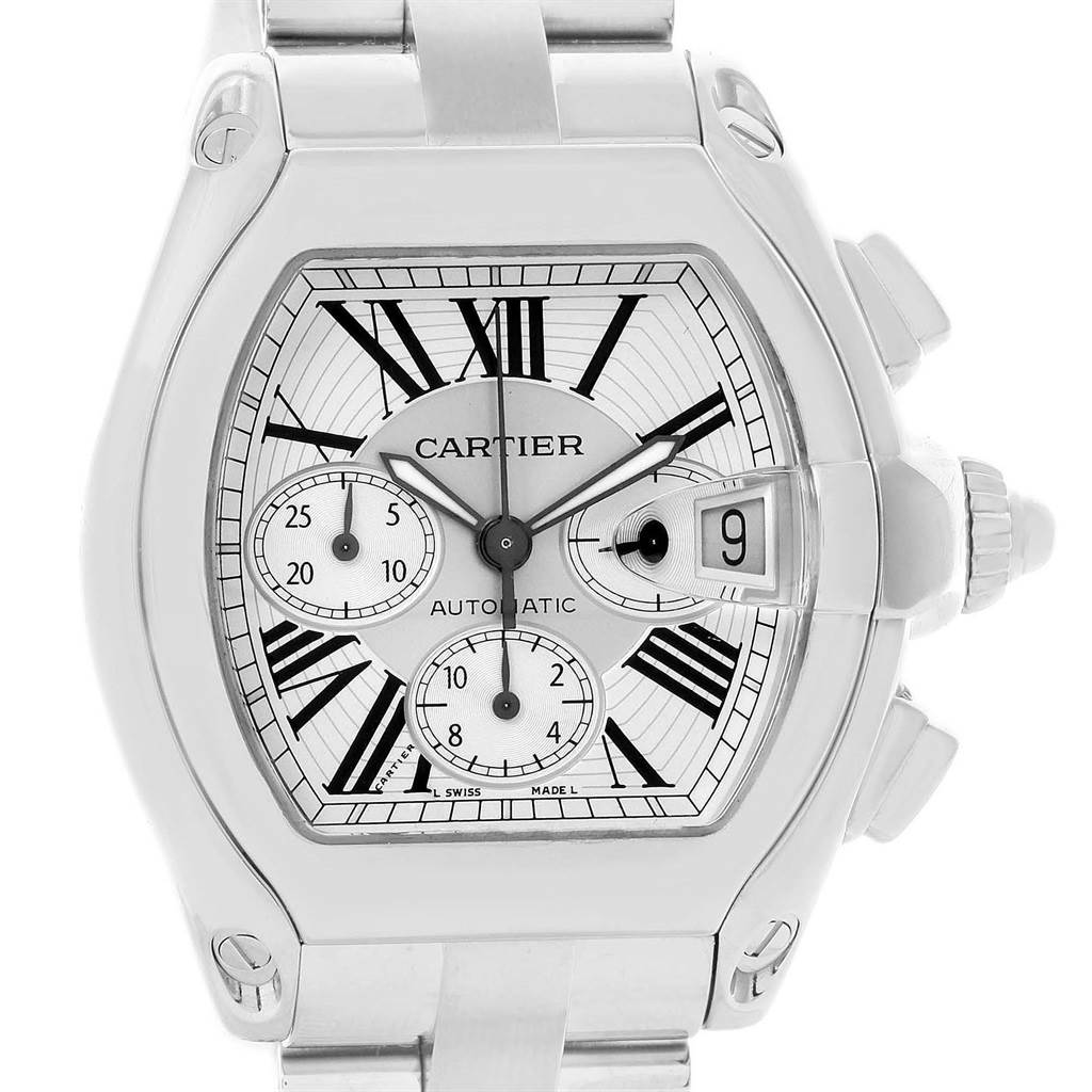 The image shows the front dial view of a Cartier Roadster W62019X6 Men's Stainless Steel Silver Dial W62019X6 Men's Stainless Steel Silver Dial watch, highlighting its face, hands, and date display.