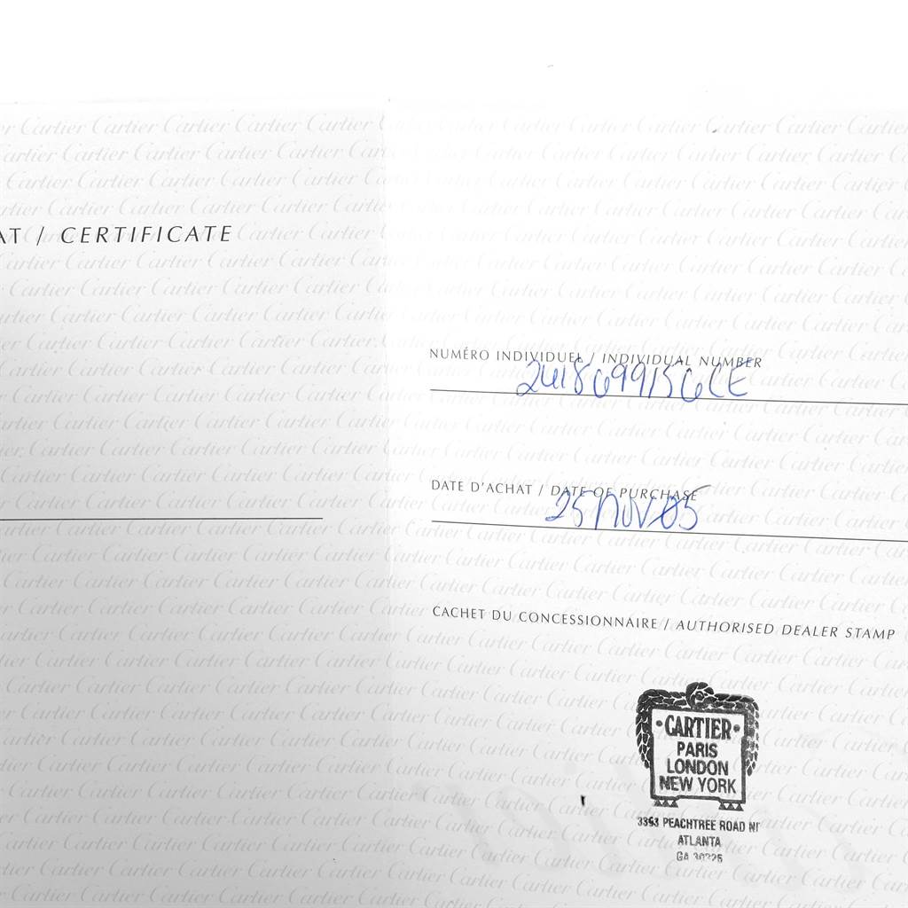 The image shows the certificate of authenticity for a Cartier Roadster W62019X6 Men's Stainless Steel Silver Dial W62019X6 Men's Stainless Steel Silver Dial watch, displaying the individual number, purchase date, and dealer stamp.