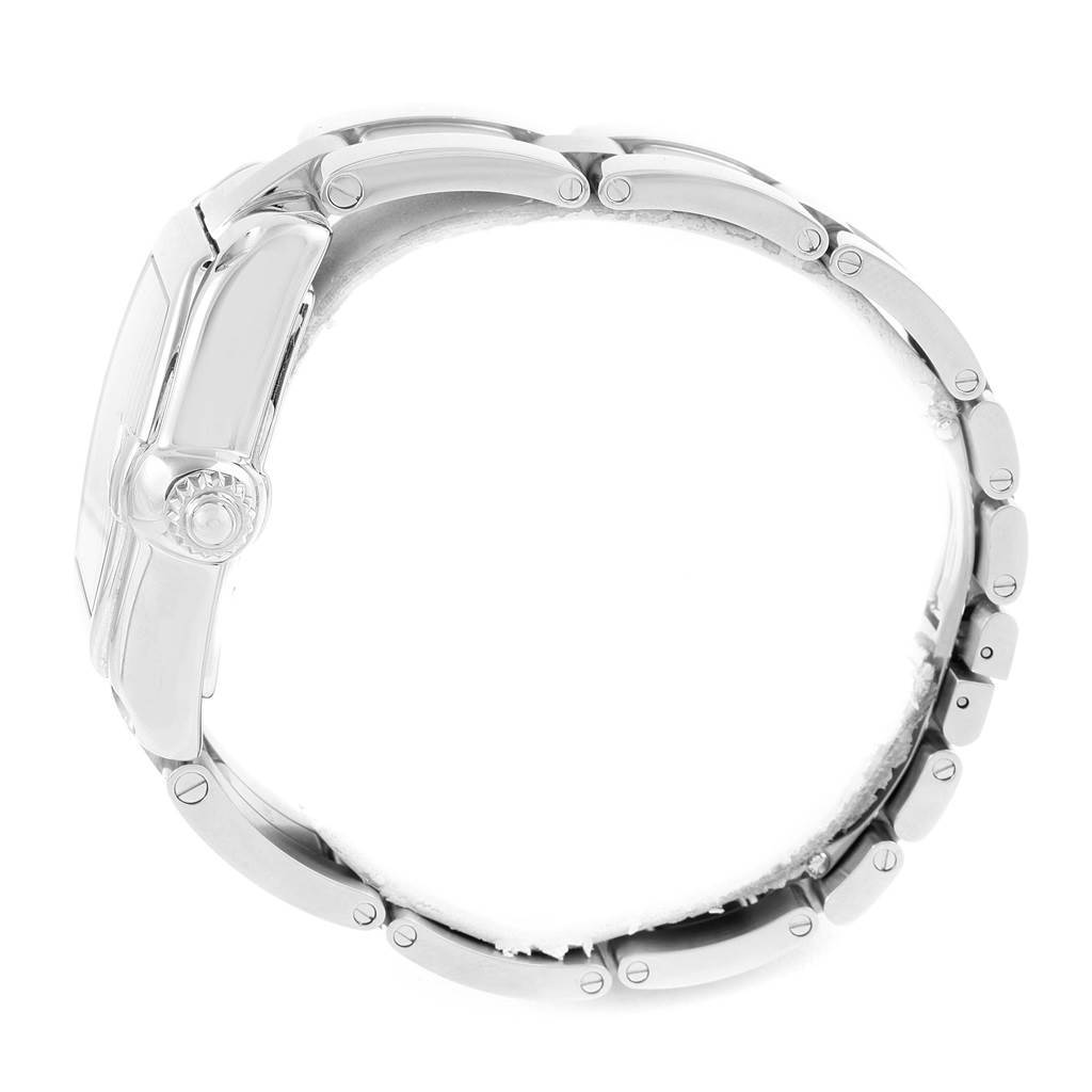 The image shows a side view of the Cartier Roadster W62041V3 Men
s Stainless Steel Black Dial W62041V3 Men
s Stainless Steel Black Dial watch, highlighting its case, crown, and metal bracelet links.