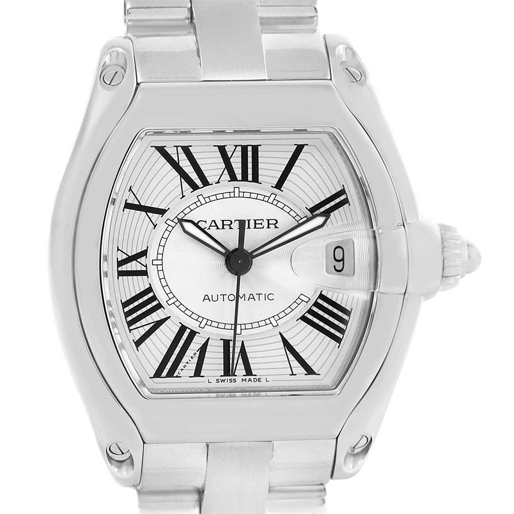 The image shows a Cartier Roadster W62025V3 Men's Stainless Steel Silver Dial W62025V3 Men's Stainless Steel Silver Dial watch from a front angle, highlighting its dial, Roman numerals, and date window.