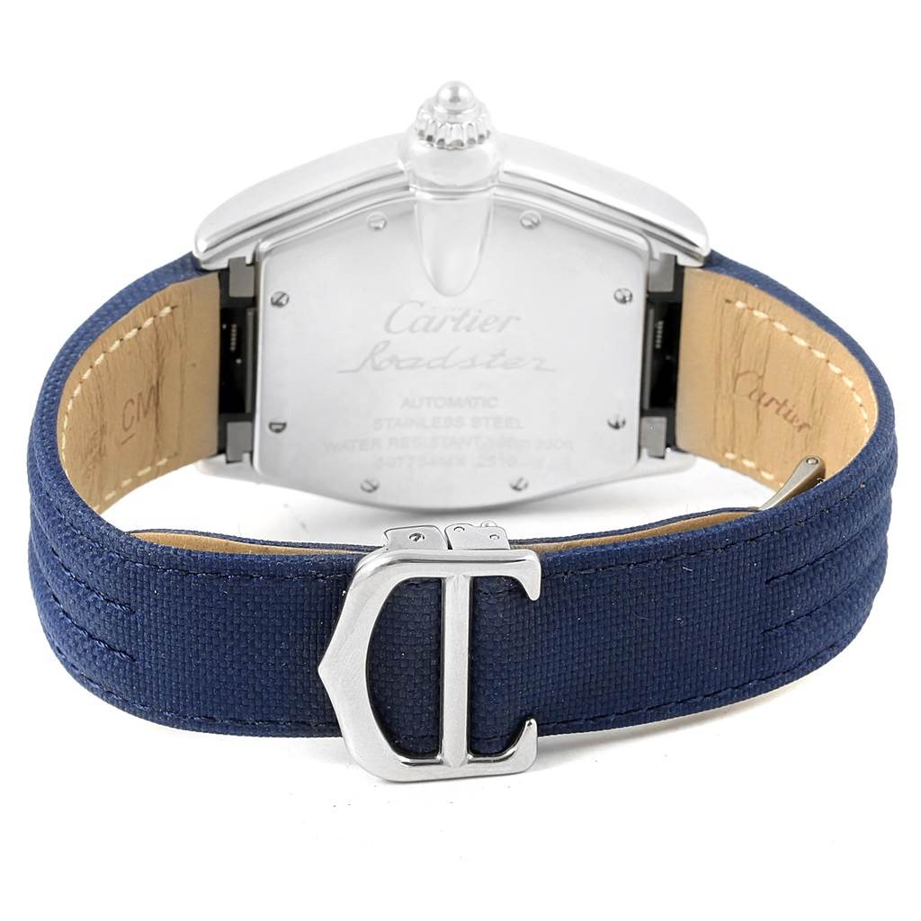 The image shows the back of the Cartier Roadster W62048V3 Men's Stainless Steel Blue Dial W62048V3 Men's Stainless Steel Blue Dial watch, displaying its stainless steel case and a blue strap with a Cartier clasp.