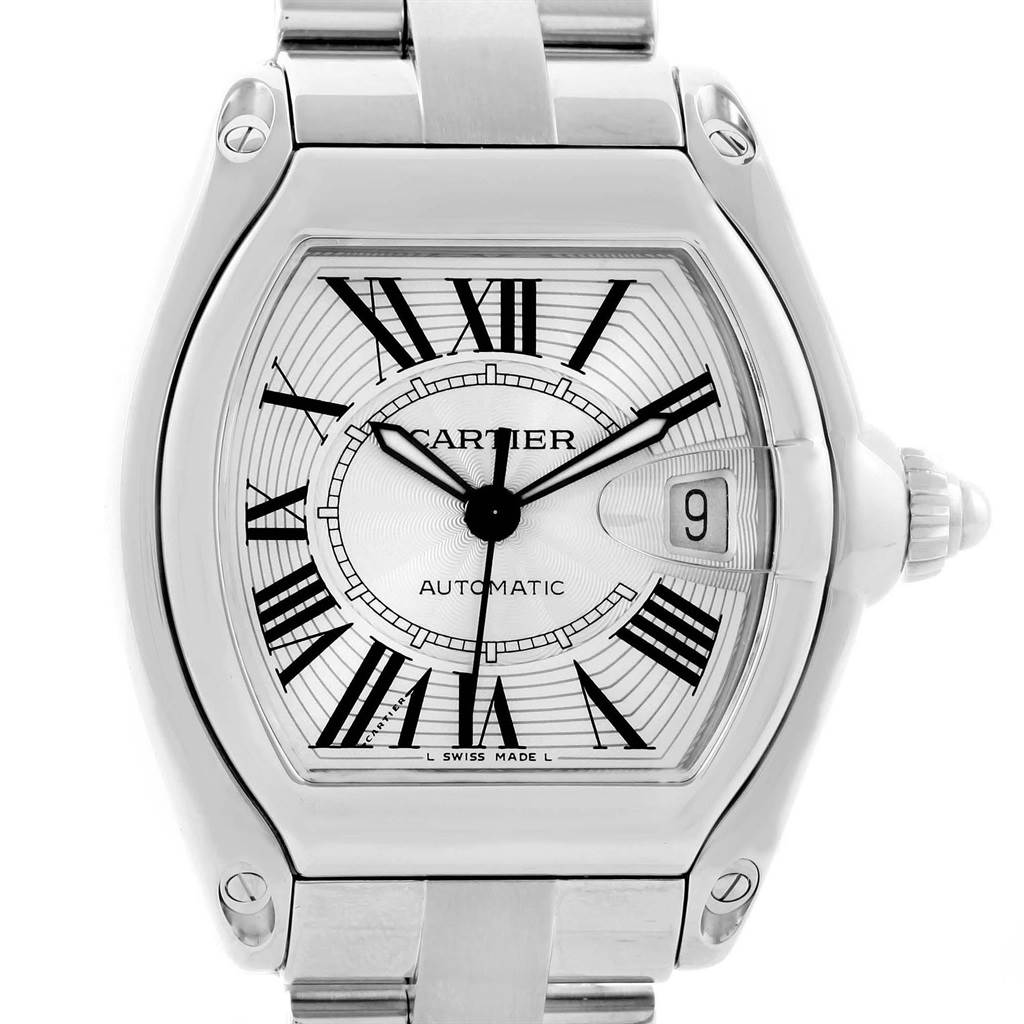 The image shows a straight-on view of the Cartier Roadster W62025V3 Men's Stainless Steel Silver Dial W62025V3 Men's Stainless Steel Silver Dial watch, highlighting the face, bezel, and part of the bracelet.