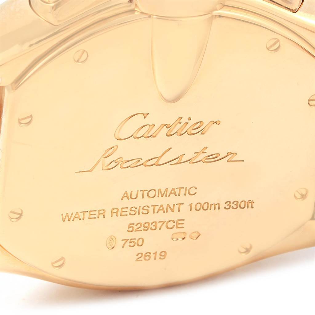 This image shows the back of a Cartier Roadster W62021Y3 Men's Yellow Gold Champagne Dial W62021Y3 Men's Yellow Gold Champagne Dial watch, highlighting its engravings and specifications.