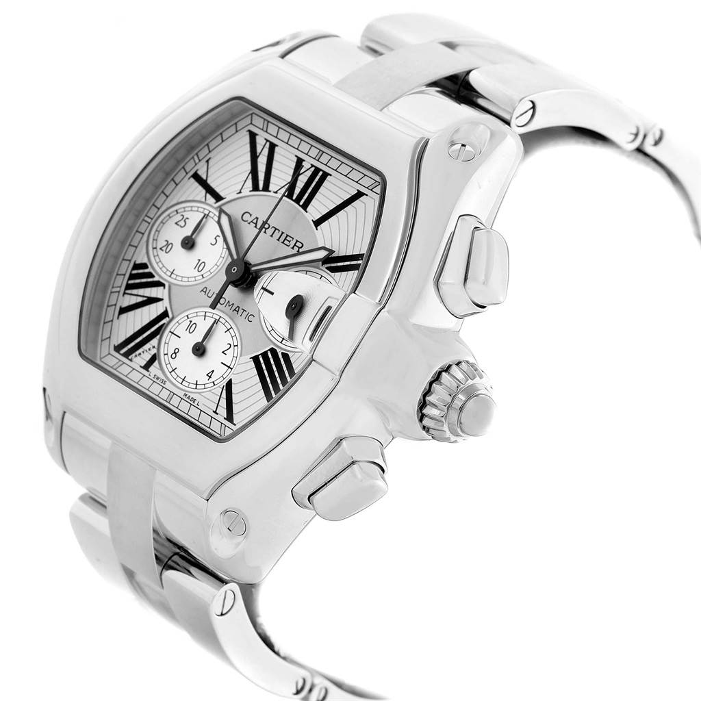 The image shows a side view of a Cartier Roadster W62019X6 Men's Stainless Steel Silver Dial W62019X6 Men's Stainless Steel Silver Dial watch, highlighting the crown, pushers, and part of the stainless steel bracelet.