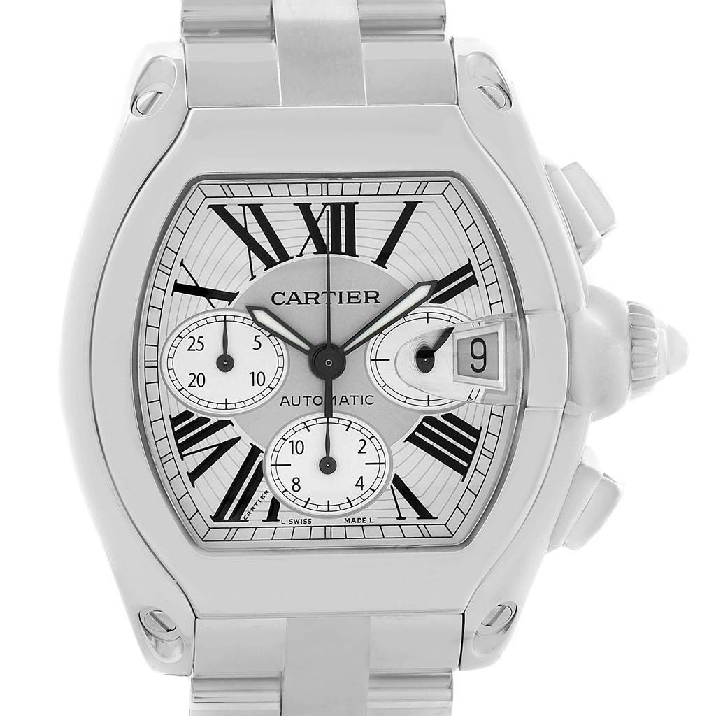The image shows a front view of the Cartier Roadster W62019X6 Men's Stainless Steel Silver Dial W62019X6 Men's Stainless Steel Silver Dial watch, featuring the dial, sub-dials, date window, and part of the bracelet.