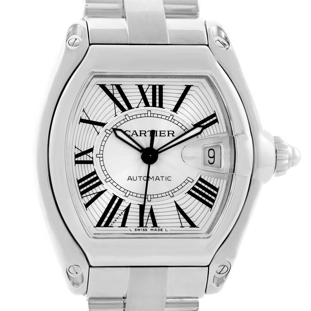 The image shows a Cartier Roadster W62025V3 Men
s Stainless Steel Silver Dial W62025V3 Men
s Stainless Steel Silver Dial watch from a front angle, highlighting the dial, Roman numeral markers, and date window.