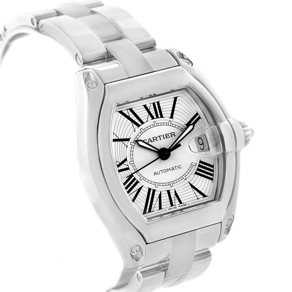 The image shows a close-up angle of the Cartier Roadster W62025V3 Men
s Stainless Steel Silver Dial W62025V3 Men
s Stainless Steel Silver Dial model watch, highlighting its face, bezel, and part of the bracelet.
