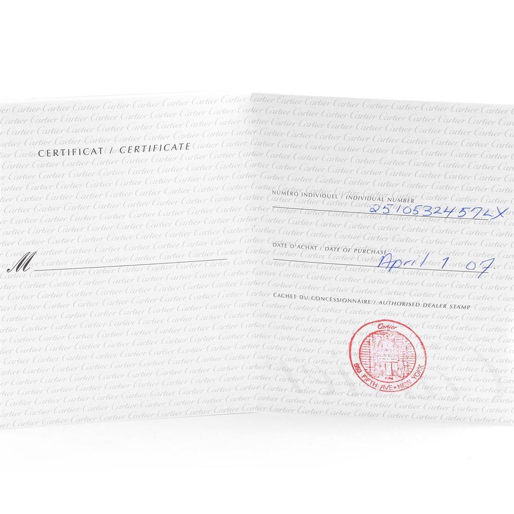 The image shows the certification card for the Roadster model by Cartier, displaying the individual number, purchase date, and dealer stamp.