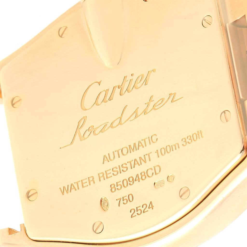 The image shows the back case of a Cartier Roadster W62005V1 Men's Yellow Gold Silver Dial W62005V1 Men's Yellow Gold Silver Dial watch, highlighting its engravings and water resistance details.