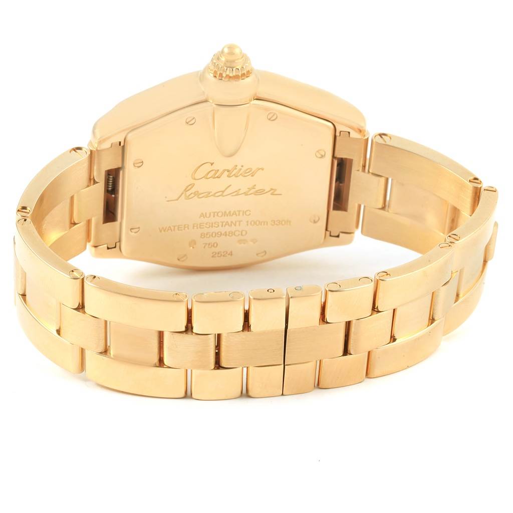 The image shows the back case and bracelet of a Cartier Roadster W62005V1 Men's Yellow Gold Silver Dial W62005V1 Men's Yellow Gold Silver Dial watch from a rear angle.