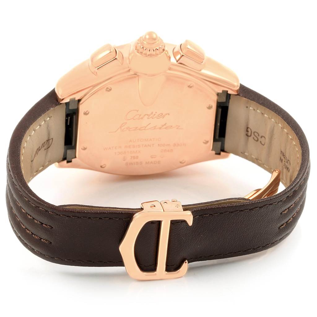 The image shows the back view of the Cartier Roadster W62042Y5 Men's Rose Gold Brown Dial W62042Y5 Men's Rose Gold Brown Dial watch with its leather strap and clasp visible.