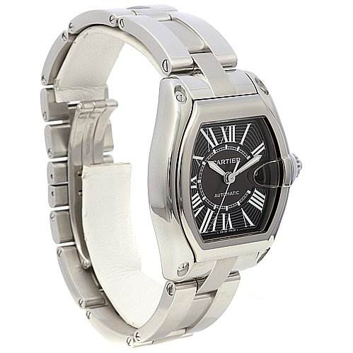 The image shows a side angle of a Cartier Roadster W62025V3 Men's Stainless Steel Black Dial W62025V3 Men's Stainless Steel Black Dial watch, highlighting the bracelet, case, and black dial with Roman numerals.