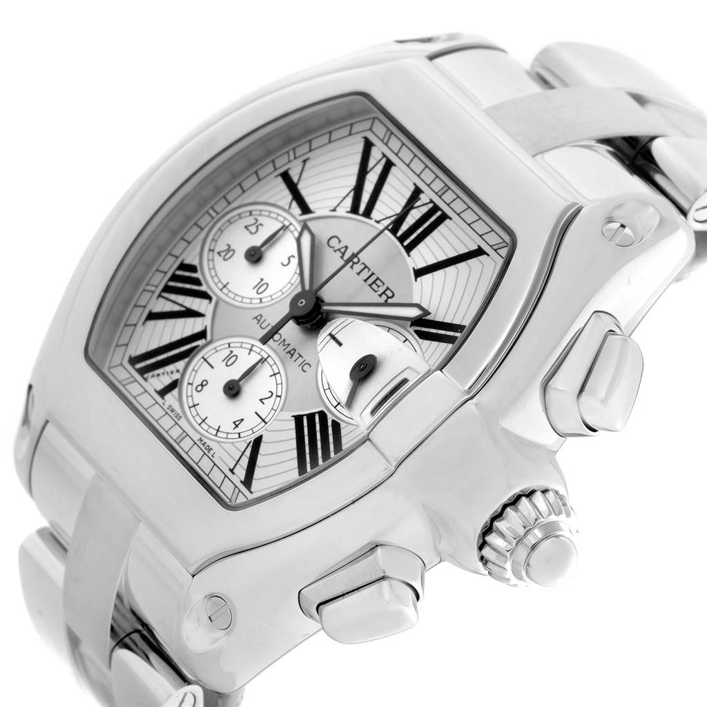 The image shows a Cartier Roadster W62019X6 Men
s Stainless Steel Silver Dial W62019X6 Men
s Stainless Steel Silver Dial watch angled to highlight its face, crown, subdials, and part of the metal bracelet.