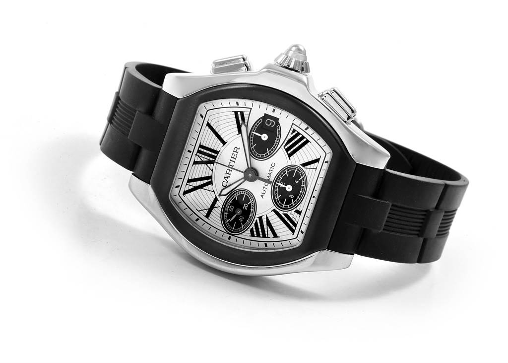 The image shows the Cartier Roadster W6206020 Men
s Stainless Steel Silver Dial W6206020 Men
s Stainless Steel Silver Dial watch at an angle displaying its face, crown, chronograph dials, and black rubber strap.