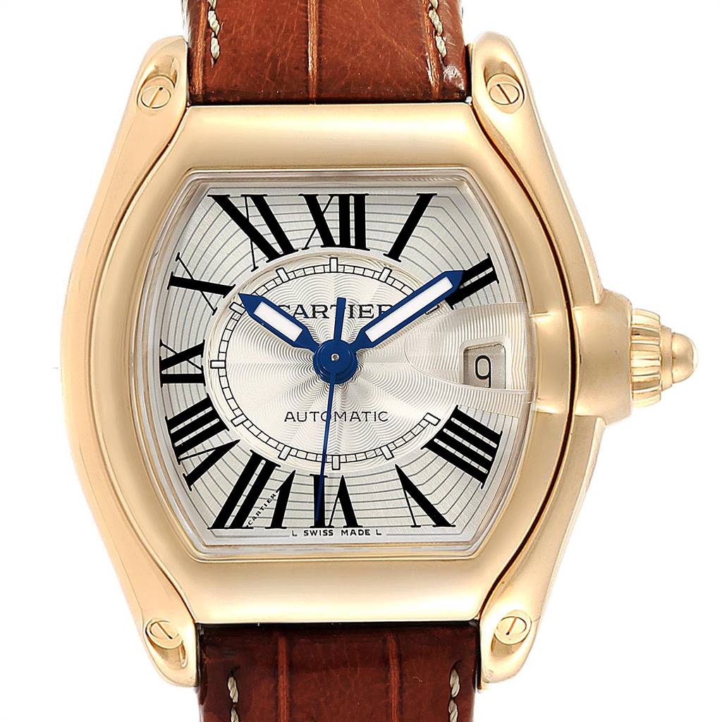 This is a front view of the Cartier Roadster W62005V2 Men's Yellow Gold Silver Dial W62005V2 Men's Yellow Gold Silver Dial watch, showcasing the dial, hands, case, and part of the strap.