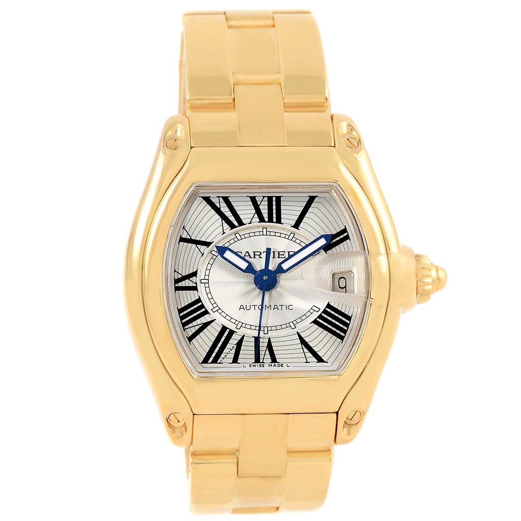 The image shows a frontal view of a Cartier Roadster W62005V1 Men's Yellow Gold Silver Dial W62005V1 Men's Yellow Gold Silver Dial watch, displaying the face, dial, crown, and bracelet.