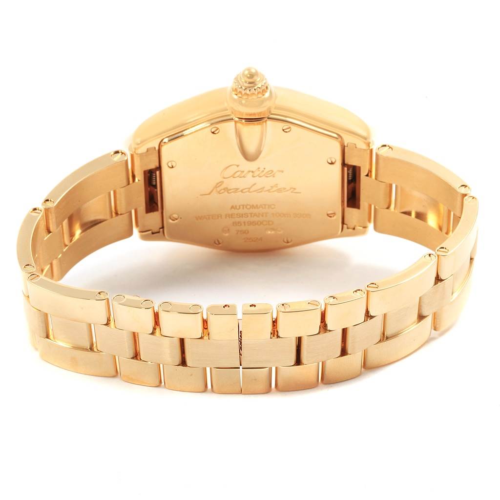 The image shows the back of the Cartier Roadster W62005V1 Men's Yellow Gold Silver Dial W62005V1 Men's Yellow Gold Silver Dial watch, focusing on its gold bracelet and case back details.