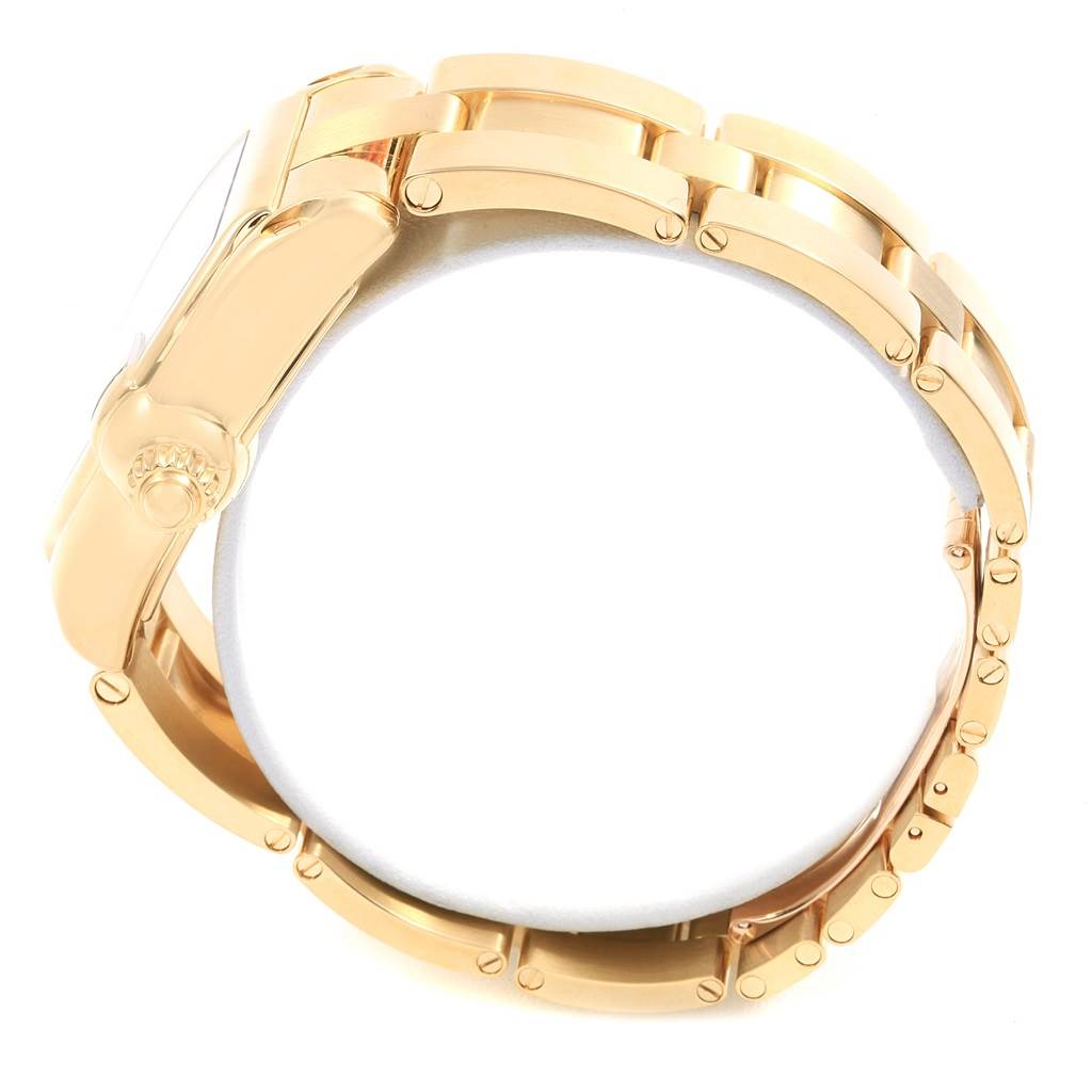 This side view of the Cartier Roadster W62005V1 Men's Yellow Gold Silver Dial W62005V1 Men's Yellow Gold Silver Dial watch shows the bracelet and crown.