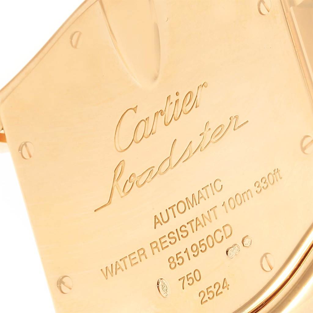 The image shows an angled view of the back plate of a Cartier Roadster W62005V1 Men's Yellow Gold Silver Dial W62005V1 Men's Yellow Gold Silver Dial watch, detailing model information and markings.