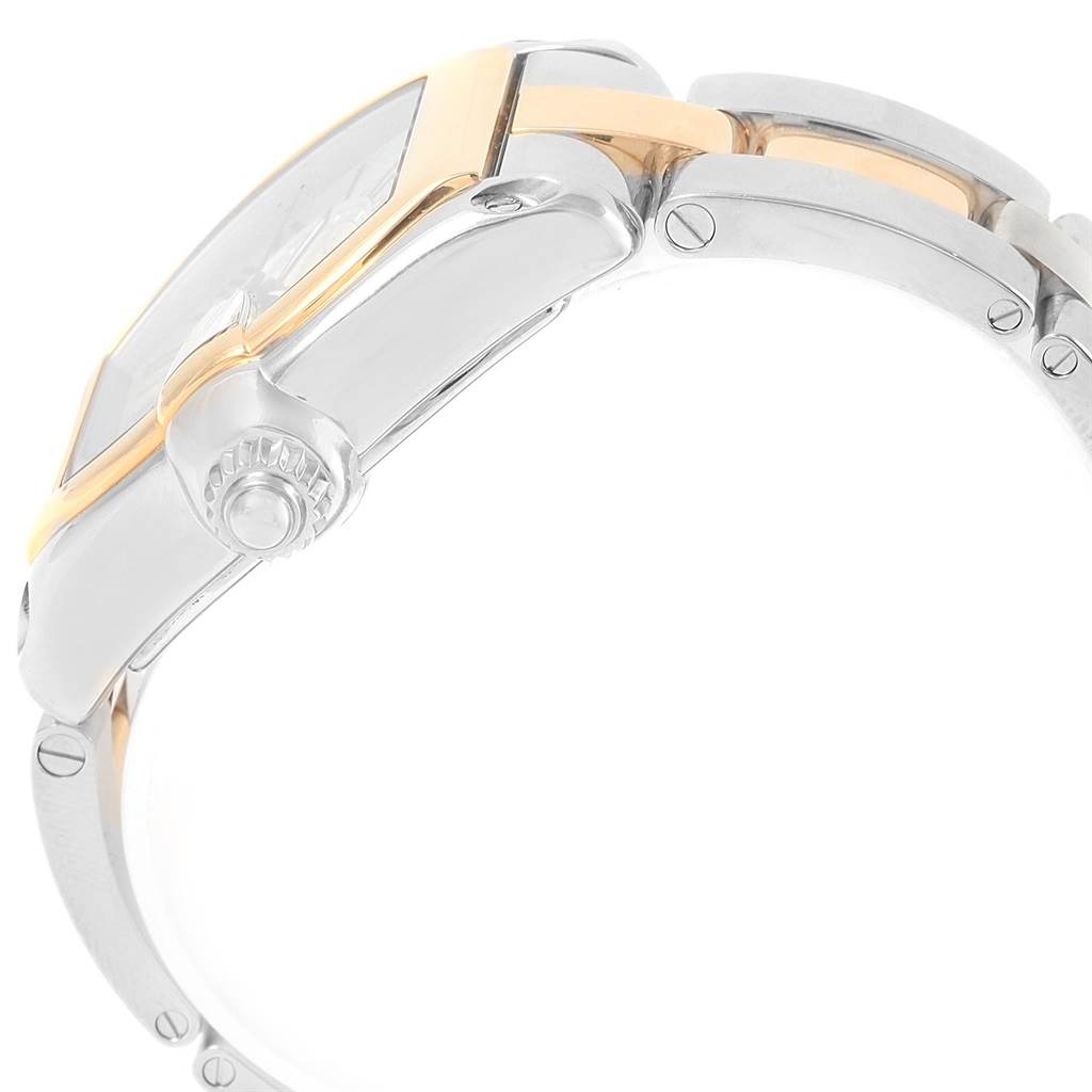 The image shows a side view of the Cartier Roadster W62031Y4 Men
s Steel and Gold (two tone) Silver Dial W62031Y4 Men
s Steel and Gold (two tone) Silver Dial watch, highlighting its crown and two-tone bracelet.