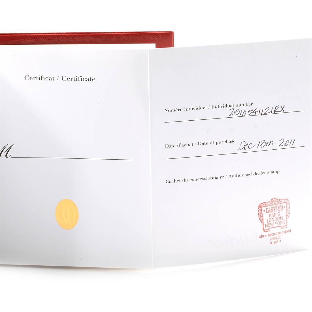 The image shows the certificate and warranty card for the Cartier Roadster W62025V3 Men
s Stainless Steel Silver Dial W62025V3 Men
s Stainless Steel Silver Dial watch.