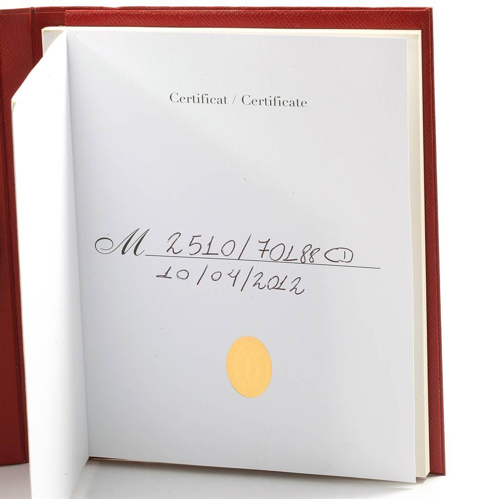 The image shows the certificate for a Roadster model by Cartier, detailing its serial number and issue date.