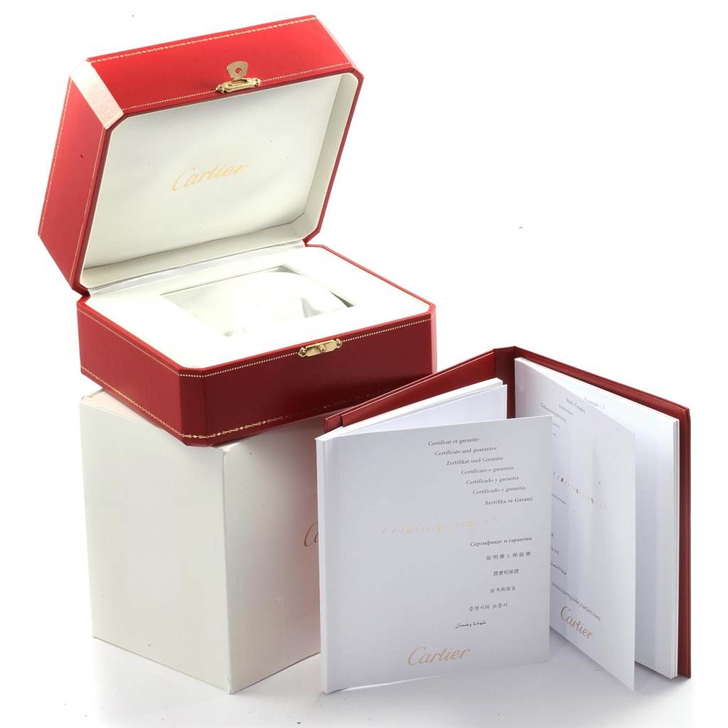 The image shows the open box and manuals for the Cartier Roadster W62048V3 Men's Stainless Steel Blue Dial W62048V3 Men's Stainless Steel Blue Dial model watch.