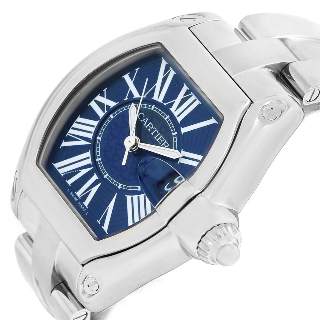 The Cartier Roadster W6206012 Men
s Stainless Steel Blue Dial W6206012 Men
s Stainless Steel Blue Dial watch is shown at an angled view, highlighting its blue dial, Roman numerals, crown, and part of the bracelet.
